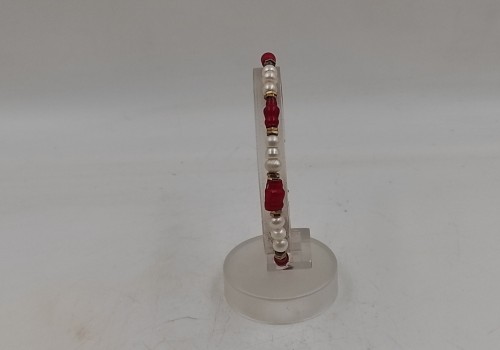 Xειροποίητο βραχιόλι από ατσάλι με Μαργαριτάρι και Κοράλλι Xειροποίητο βραχιόλι από ατσάλι με Μαργαριτάρι και Κοράλλι