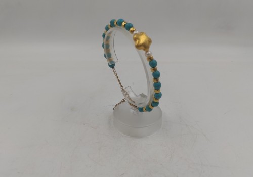 Xειροποίητο βραχιόλι από ατσάλι με Χαολίτης  και Μαργαριτάρι  Xειροποίητο βραχιόλι από ατσάλι με Χαολίτης  και Μαργαριτάρι