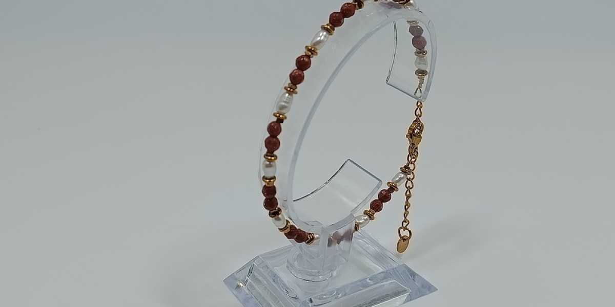 Βραχιόλι από ανοξείδωτο ατσάλι επίχρυσο με ηλιόλιθο, μαργαριτάρι και αιματίτη Βραχιόλι από ανοξείδωτο ατσάλι επίχρυσο με ηλιόλιθο, μαργαριτάρι και αιματίτη