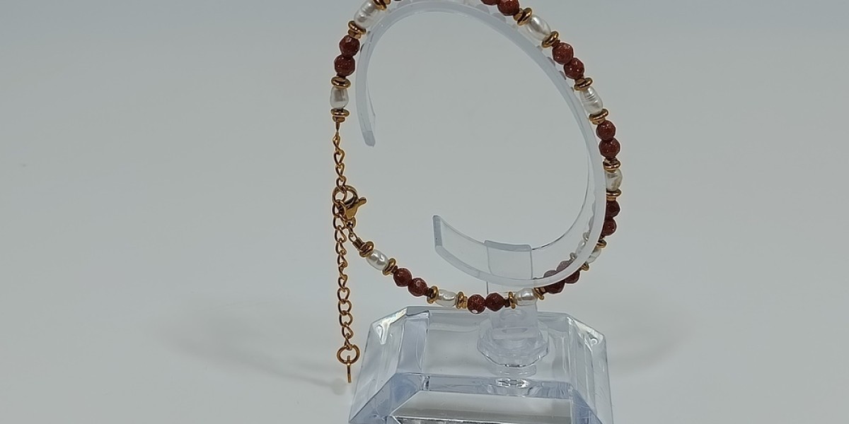 Βραχιόλι από ανοξείδωτο ατσάλι επίχρυσο με ηλιόλιθο, μαργαριτάρι και αιματίτη Βραχιόλι από ανοξείδωτο ατσάλι επίχρυσο με ηλιόλιθο, μαργαριτάρι και αιματίτη