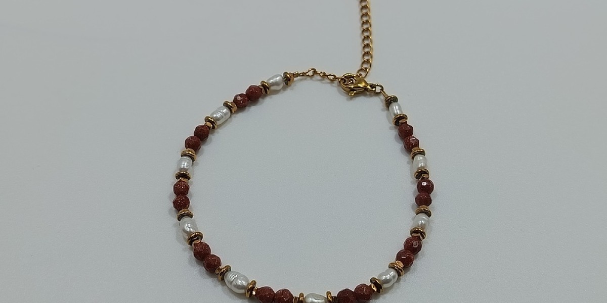 Βραχιόλι από ανοξείδωτο ατσάλι επίχρυσο με ηλιόλιθο, μαργαριτάρι και αιματίτη Βραχιόλι από ανοξείδωτο ατσάλι επίχρυσο με ηλιόλιθο, μαργαριτάρι και αιματίτη