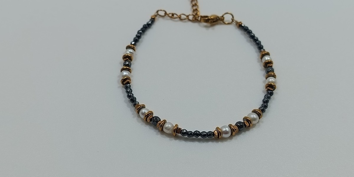 Βραχιόλι από Ανοξείδωτο Ατσάλι Επίχρυσο με Αιματίτη και Μαργαριτάρι Βραχιόλι από Ανοξείδωτο Ατσάλι Επίχρυσο με Αιματίτη και Μαργαριτάρι