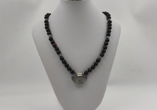 κολιέ από ατσάλι και brass με άιρον τάγκερ  και αιματίτης