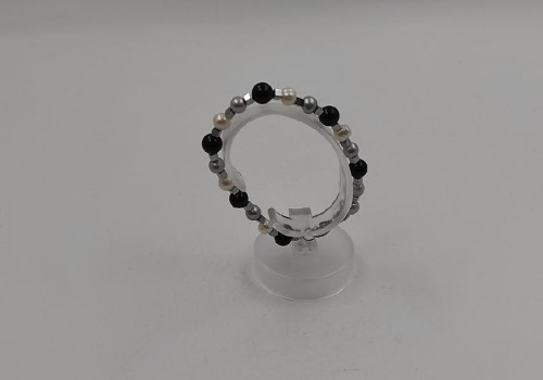 χειροποίητο βραχιόλι από ατσάλι με μαργαριτάρι,όνυχα και αιματίτη